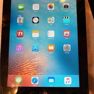 iPad 2 - Silver with Black Frame. Pre owned in good condition. Good for kids